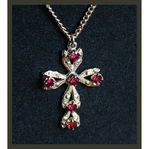 vintage gold-tone cross and chain with red stones signed Justine